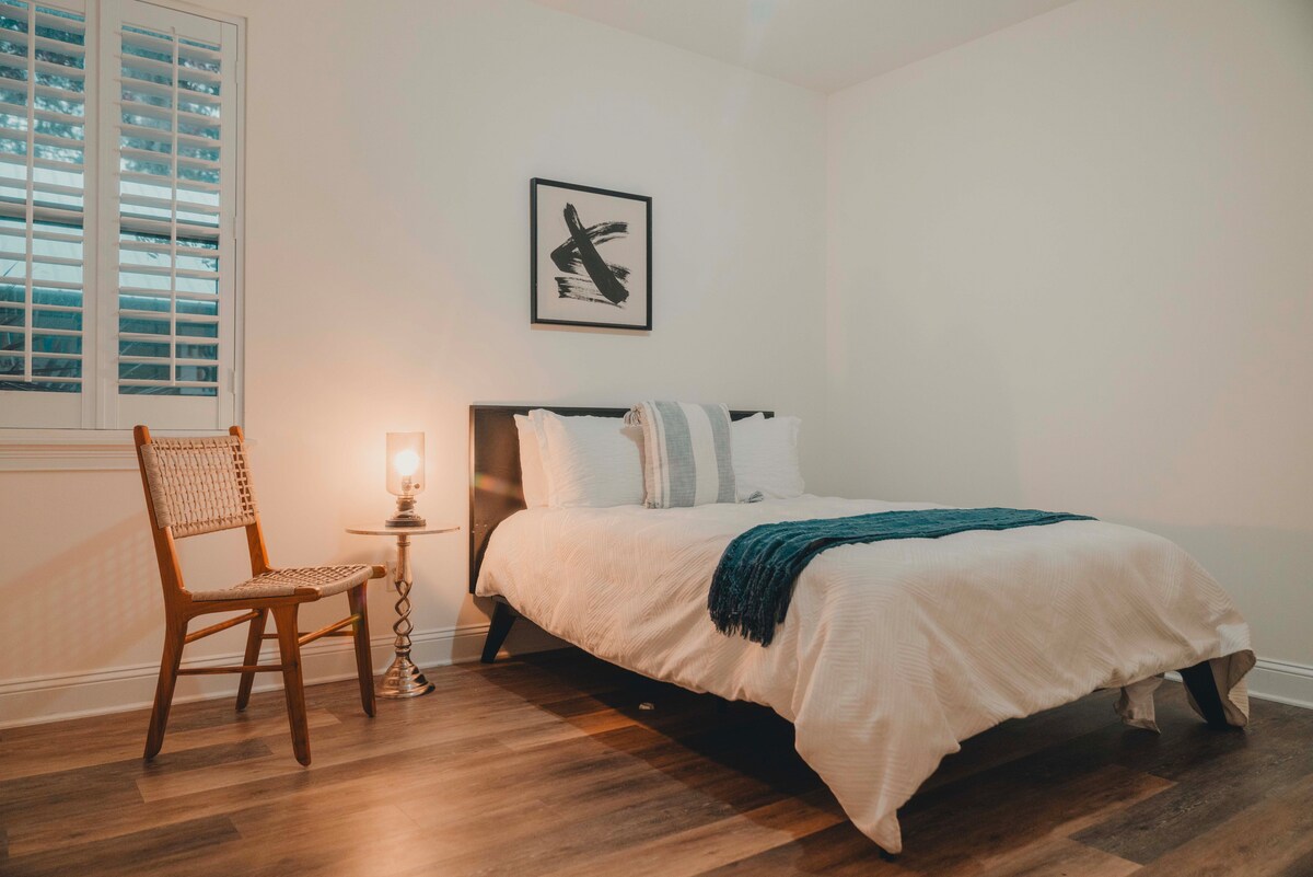 Master bedroom with king bed and washed-linen bedding