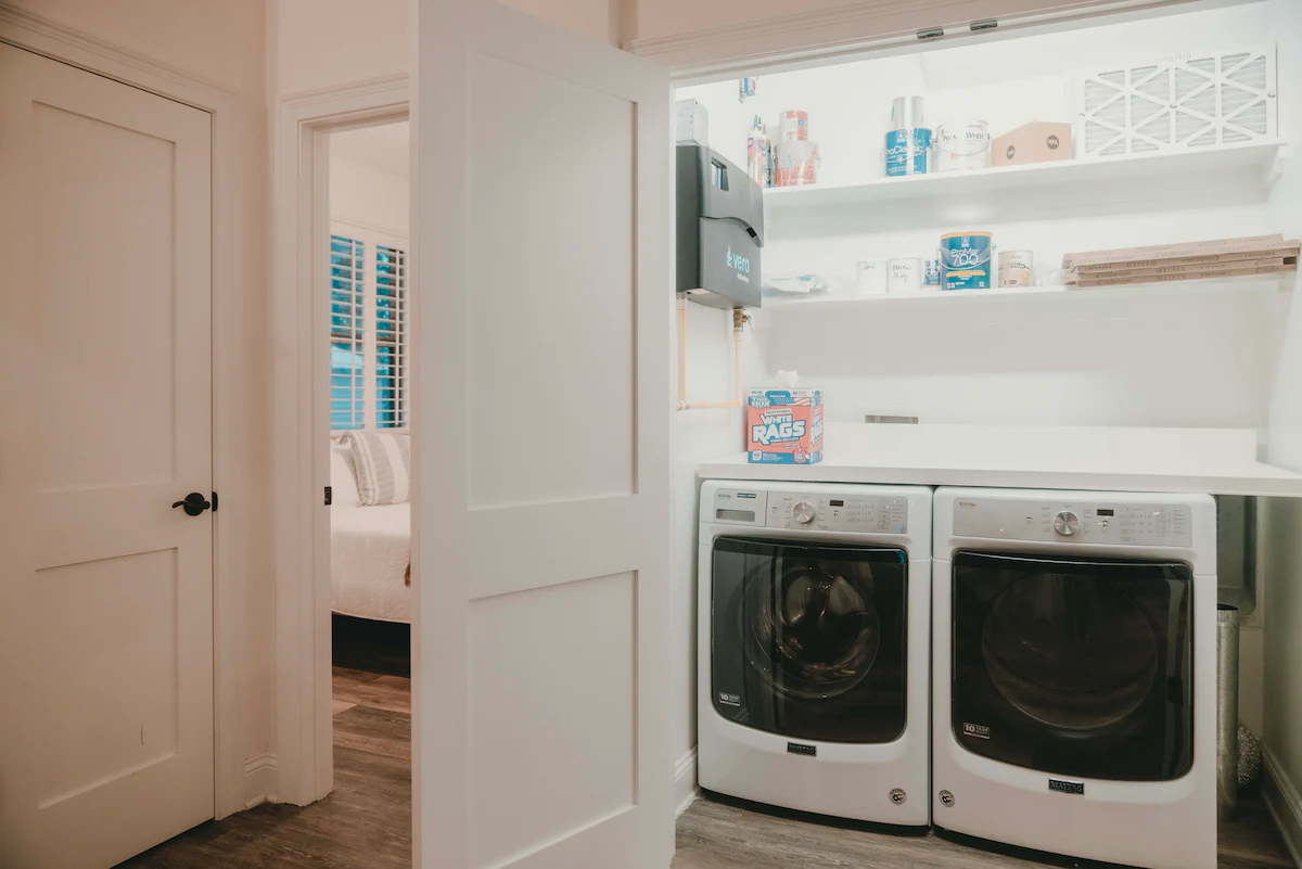 Full-size washer and dryer in laundry room