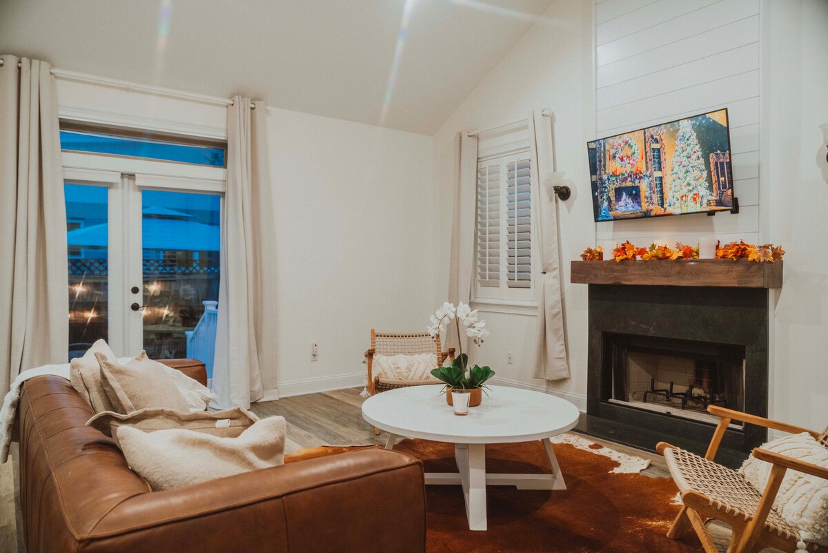Living room from second angle showing fireplace
